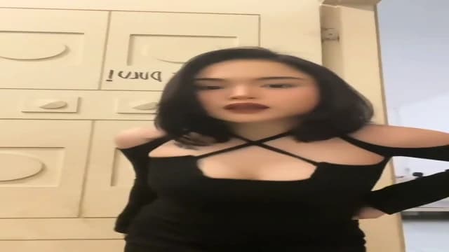 Brunette Indonesian Teen Teases In Black Dress