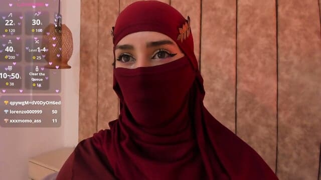 Rawiya Have On Maroon Veil And Outfit 6