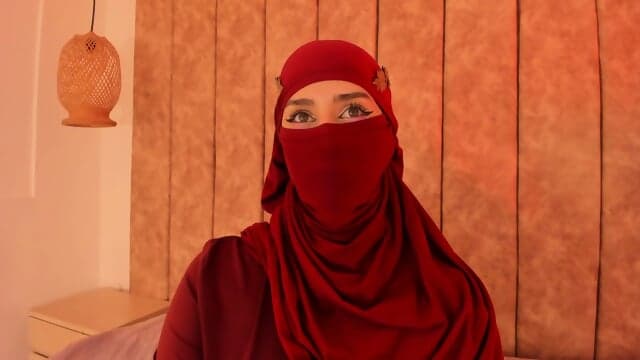 Rawiya Have On Maroon Veil And Outfit 9